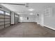 This garage is spacious and features overhead storage racks and hooks at 208 Hillwood Dr, Sanford, NC 27332