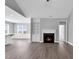 Open concept living area with fireplace and seamless flow into the kitchen and dining at 208 Hillwood Dr, Sanford, NC 27332
