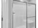 Glass door encloses a shower that features a built in seat at 208 Hillwood Dr, Sanford, NC 27332