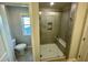 Bathroom with shower, toilet and a small sink at 3014 Freewinds Way # 45, Cary, NC 27519