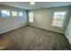 Bright bedroom with carpet and multiple windows at 3014 Freewinds Way # 45, Cary, NC 27519