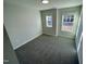Spacious bedroom with carpet and two windows at 3014 Freewinds Way # 45, Cary, NC 27519