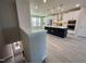 Modern kitchen with island and stainless steel appliances at 3014 Freewinds Way # 45, Cary, NC 27519