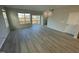 Spacious living room with hardwood floors and access to deck at 3014 Freewinds Way # 45, Cary, NC 27519