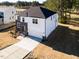 Attractive new construction home with stone and siding exterior, a driveway, and landscaping in a suburban neighborhood at 556 Barbour Farm Ln, Four Oaks, NC 27524