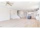 Spacious living area featuring hardwood floors, recessed lighting and an open staircase at 556 Barbour Farm Ln, Four Oaks, NC 27524