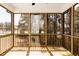 Relax on the screened-in porch with views of the natural surroundings, blending indoor and outdoor living at 556 Barbour Farm Ln, Four Oaks, NC 27524