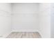 Walk-in closet featuring wire shelving and neutral walls at 556 Barbour Farm Ln, Four Oaks, NC 27524