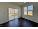 Bright dining room with sliding glass door to deck and hardwood floors at 392 Longbow Dr, Middlesex, NC 27557