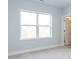 Light-filled bedroom with plush carpet, large windows, and a neutral color palette at 1142 Cottonsprings Dr, Wendell, NC 27591