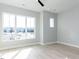 Spacious bedroom with large windows offering a bright and airy atmosphere at 1142 Cottonsprings Dr, Wendell, NC 27591