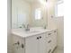 Modern bathroom features double vanity with white countertop and ample storage at 1146 Cottonsprings Dr, Wendell, NC 27591