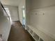 Bright entryway with built-in bench and coat hooks at 3010 Freewinds Way # 43, Cary, NC 27519