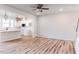 Living room with open concept kitchen and hardwood floors at 184 Pinkie Ln, Garner, NC 27529