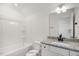 Bathroom features a shower and tub combo, granite counters and a white vanity at 573 Highview Drive Dr, Benson, NC 27504