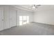Bright bedroom featuring neutral carpet, a ceiling fan and white doors and trim at 573 Highview Drive Dr, Benson, NC 27504