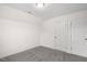 Carpeted bedroom featuring a standard closet, neutral walls, and base molding at 573 Highview Drive Dr, Benson, NC 27504