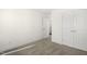 Carpeted bedroom featuring a standard closet, neutral walls, and base molding at 573 Highview Drive Dr, Benson, NC 27504