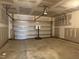 Spacious garage with an automatic door opener and a basketball hoop at 573 Highview Drive Dr, Benson, NC 27504