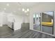 Bright kitchen island with stainless steel dishwasher and sliding door to backyard at 573 Highview Drive Dr, Benson, NC 27504