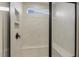 Updated shower featuring a built-in bench and cubbies, plus a rainfall shower head at 573 Highview Drive Dr, Benson, NC 27504