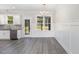 Kitchen features white shaker cabinets and granite countertops at 607 Tuscany Cir, Princeton, NC 27569