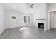 Living room with hardwood floors and fireplace at 607 Tuscany Cir, Princeton, NC 27569