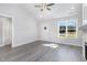 Living room with hardwood floors and access to bathroom at 607 Tuscany Cir, Princeton, NC 27569