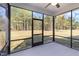 Spacious screened porch overlooking the backyard at 607 Tuscany Cir, Princeton, NC 27569