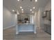 Spacious kitchen with a granite island, stainless steel appliances, recessed lights, and ample cabinetry at 639 Sweet Potato Lane # 3, Nashville, NC 27856