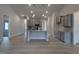 Open-concept living space featuring a kitchen island, recessed lighting, and sightlines into adjoining rooms at 639 Sweet Potato Lane # 3, Nashville, NC 27856
