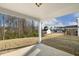 View from the covered patio showing the lawn and surrounding neighborhood at 82 Gander Dr, Benson, NC 27504