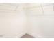 A walk-in closet with shelving is ready to be filled at 82 Gander Dr, Benson, NC 27504