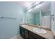 Bathroom featuring double sinks and an extra large mirror at 128 Dove Cottage Ln, Cary, NC 27519
