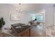 Open dining space offers room to gather with modern chandelier and stairway access at 128 Dove Cottage Ln, Cary, NC 27519