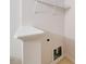 Laundry area featuring hookups and a wire shelf for storage at 128 Dove Cottage Ln, Cary, NC 27519