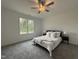 Inviting bedroom with a large window and neutral decor for a peaceful ambiance at 234 Danube Dr, Zebulon, NC 27597