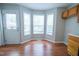 Cozy breakfast nook with bay windows providing natural light at 310 E Horton St, Zebulon, NC 27597
