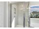 Shower stall with glass enclosure and built-in shelving at 26 Steppe Way, Garner, NC 27529