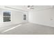 Bright and airy bedroom with carpet and two windows at 26 Steppe Way, Garner, NC 27529