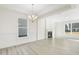 Spacious dining room with fireplace and hardwood floors at 26 Steppe Way, Garner, NC 27529