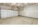Spacious garage with overhead door and ample floor space at 26 Steppe Way, Garner, NC 27529