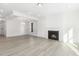 Living room with fireplace and hardwood floors at 26 Steppe Way, Garner, NC 27529
