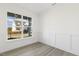 Bright office features wood-look floors and wainscoting at 26 Steppe Way, Garner, NC 27529