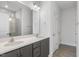 Elegant bathroom with double vanity and grey cabinets at 36 Steppe Way, Garner, NC 27529