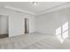 Spacious bedroom with plush carpeting and an ensuite bathroom at 36 Steppe Way, Garner, NC 27529