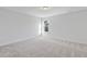 Sunny bedroom with carpeted floor and window at 36 Steppe Way, Garner, NC 27529