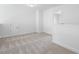 Spacious bedroom with carpeted floor and access to a loft area at 36 Steppe Way, Garner, NC 27529