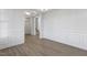 Dining room with hardwood floors and access to hallway at 36 Steppe Way, Garner, NC 27529