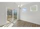 Dining room with sliding glass doors leading to a screened porch at 36 Steppe Way, Garner, NC 27529